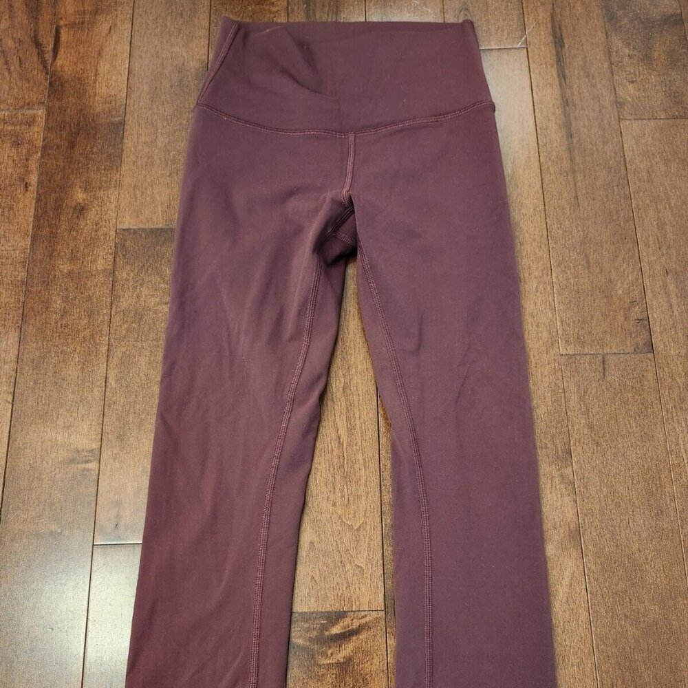 Lululemon women's burgundy leggings in size 4